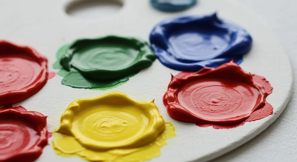 A pile of travel brochures on China inside a classroom.