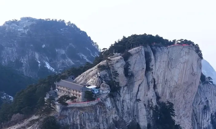 New Year on Frontlines with Sentinel in Clouds on Huashan Mountain