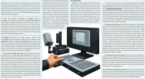 A meeting room with a round table and flags of Uzbekistan.