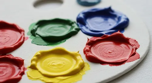 A pile of travel brochures on China inside a classroom.