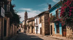 Abstrakte Formen verschiedener Kulturen, verwoben mit lebendigen Farben, symbolisieren die internationale Zusammenarbeit in der Kunstpädagogik.